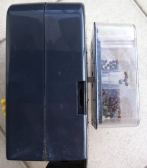 Side view of the automatic fish feeder Side view of the automatic fish feeder